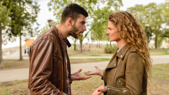 a girl talking to a boy