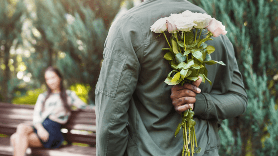 man bringing flowers to his russian date